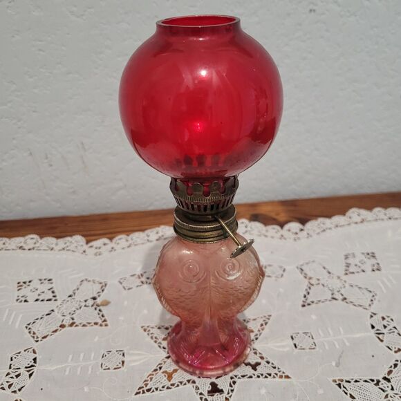 Vtg Mini Oil Lamp Cranberry glass globe with fish bottom RARE Flaw Old World - Picture 1 of 12